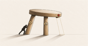 A three-legged stool with one leg missing and a figure bracing it, illustrating the empty commercial number two beside the accountant.
