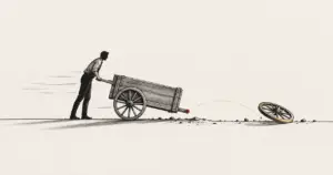 A cart that has lost an intact wheel after being pushed too fast, illustrating what failure tells a founder about the road and the pace.