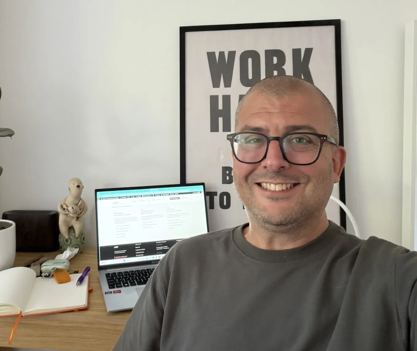 Tom Wood at his desk in his home office